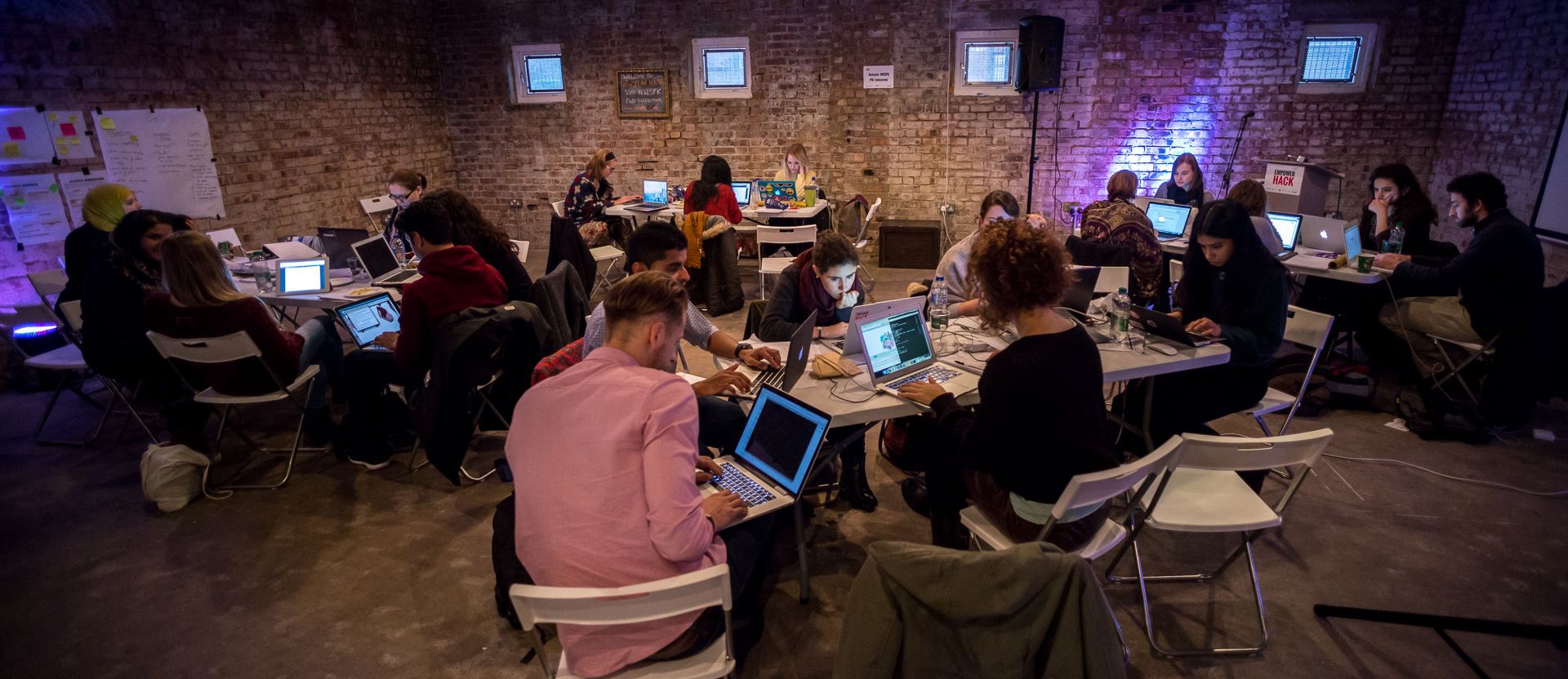 Community workshop event taking place in the converted basement space