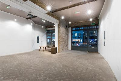 Finished empty commercial unit with exposed brick and polished concrete floor