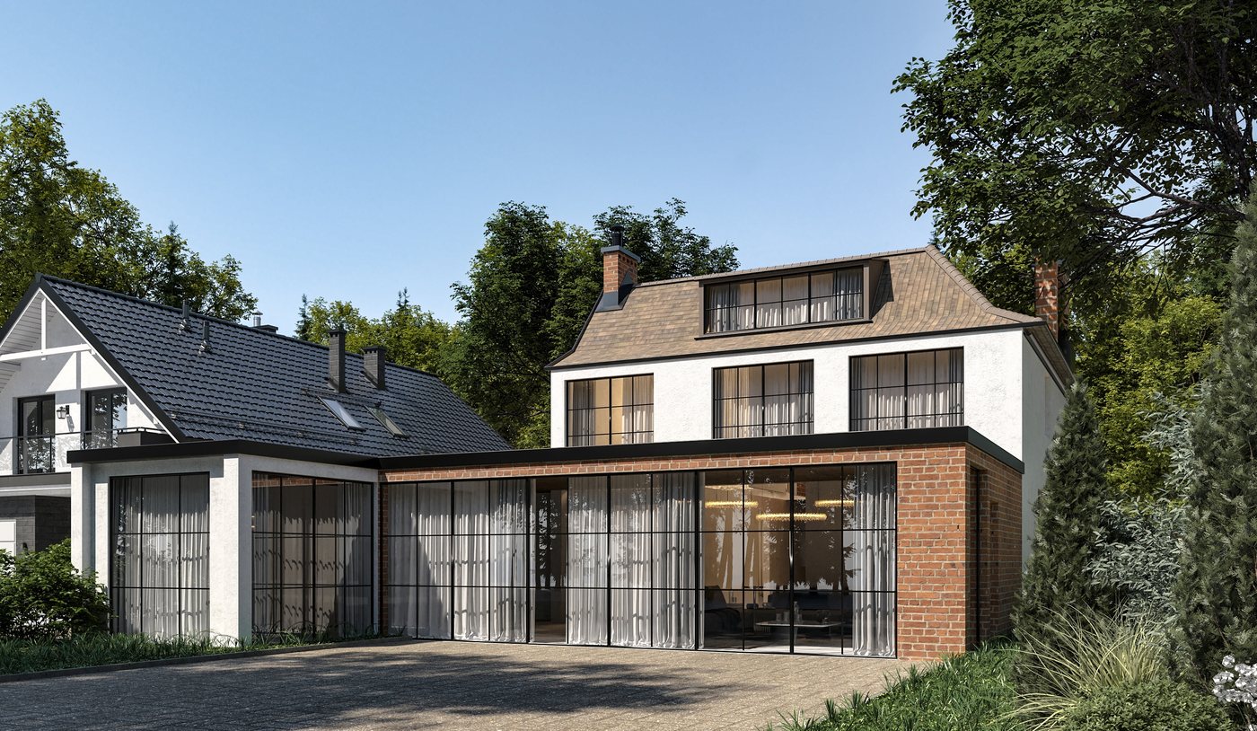 Rear facade of the extension with full-height steel-framed glazing and brick cladding opening onto the garden