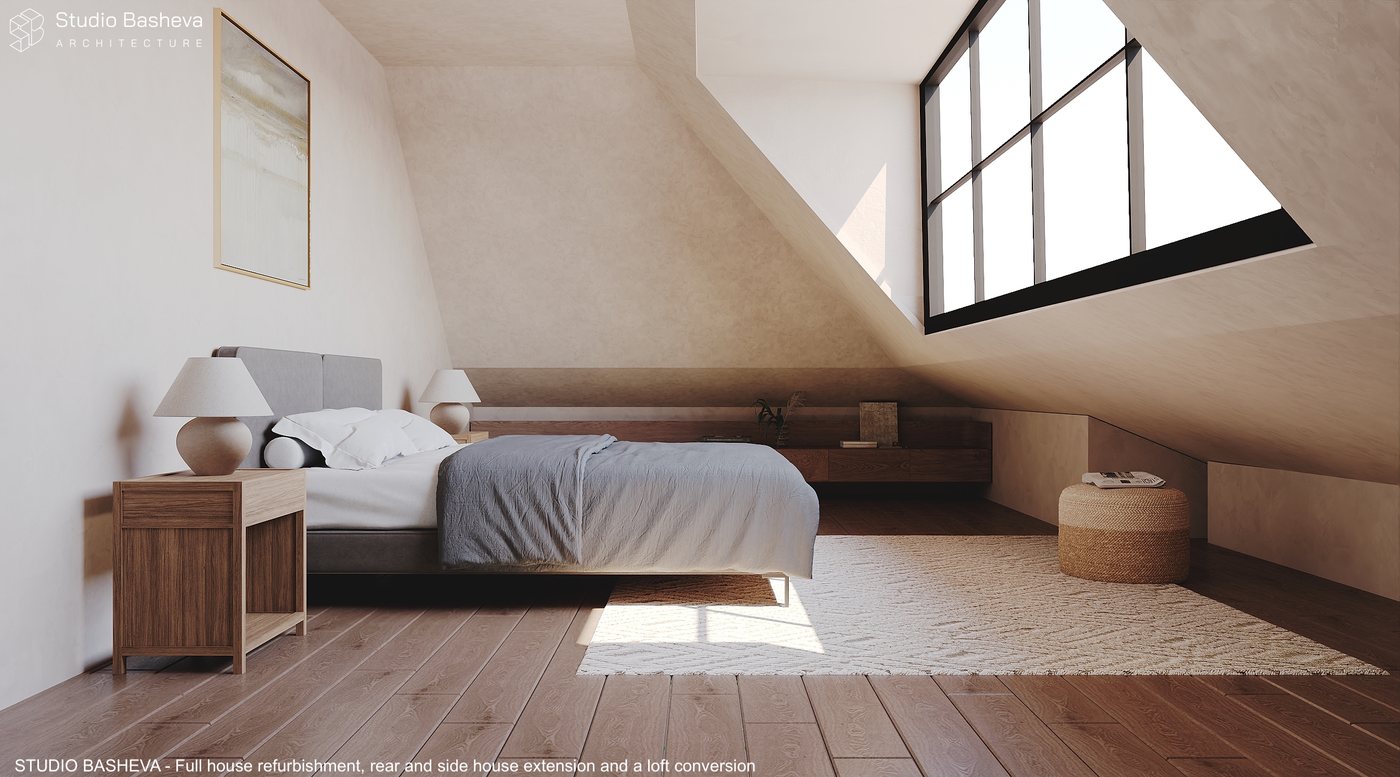 Loft conversion bedroom with sloped ceiling and tall steel-framed dormer window