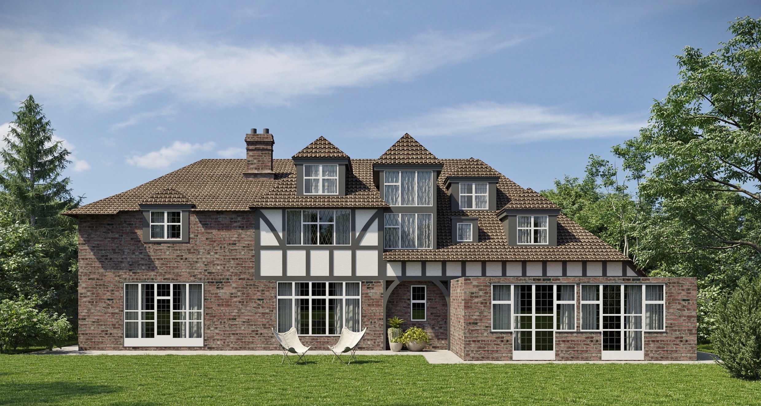 Rear elevation showing the glazed garden room extension alongside the original Tudor-revival brickwork