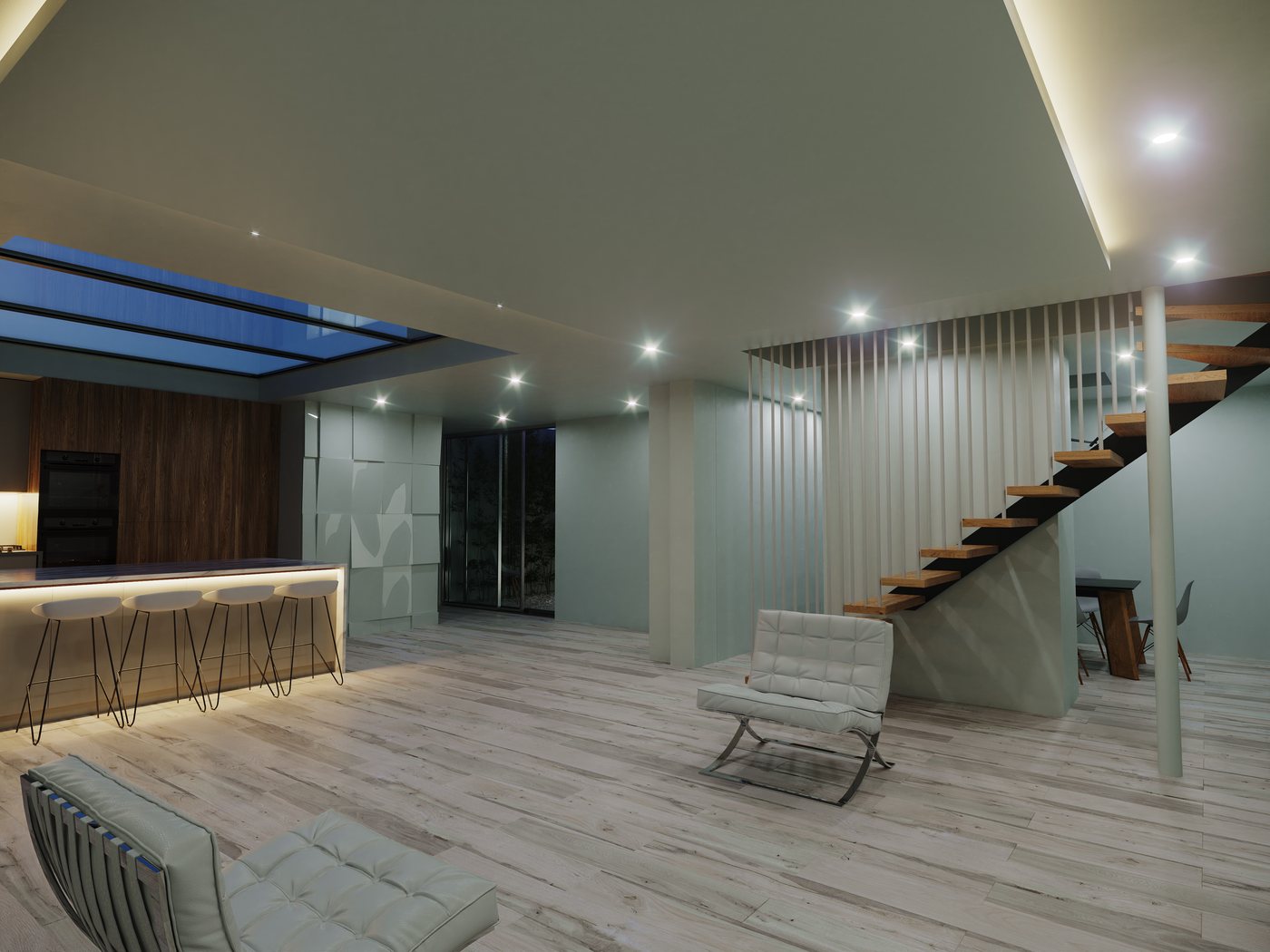 Open-plan ground floor at night — ambient ceiling lighting animates the skylight, staircase screen and kitchen beyond