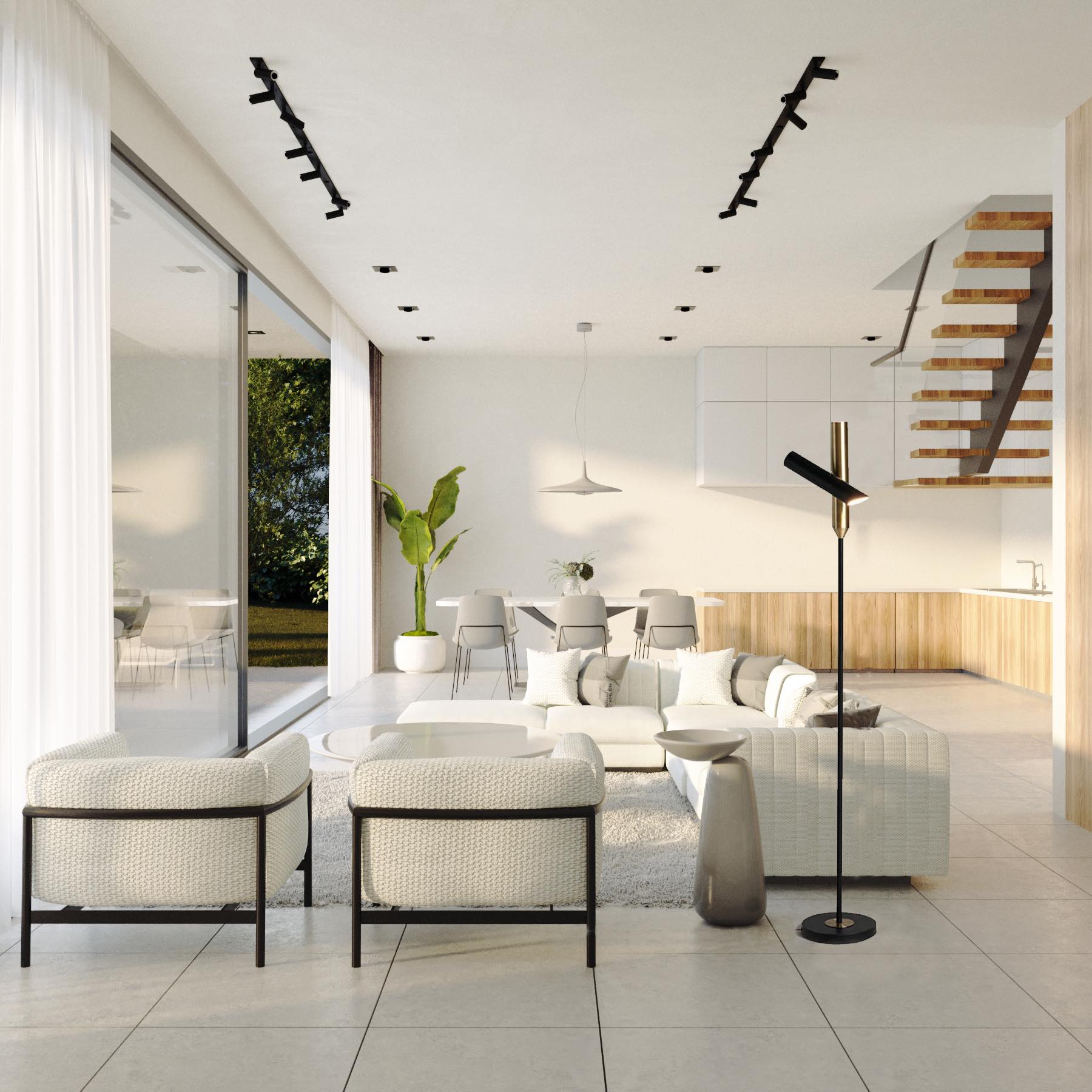 Living area of N120 villa with sectional sofa opening onto the garden