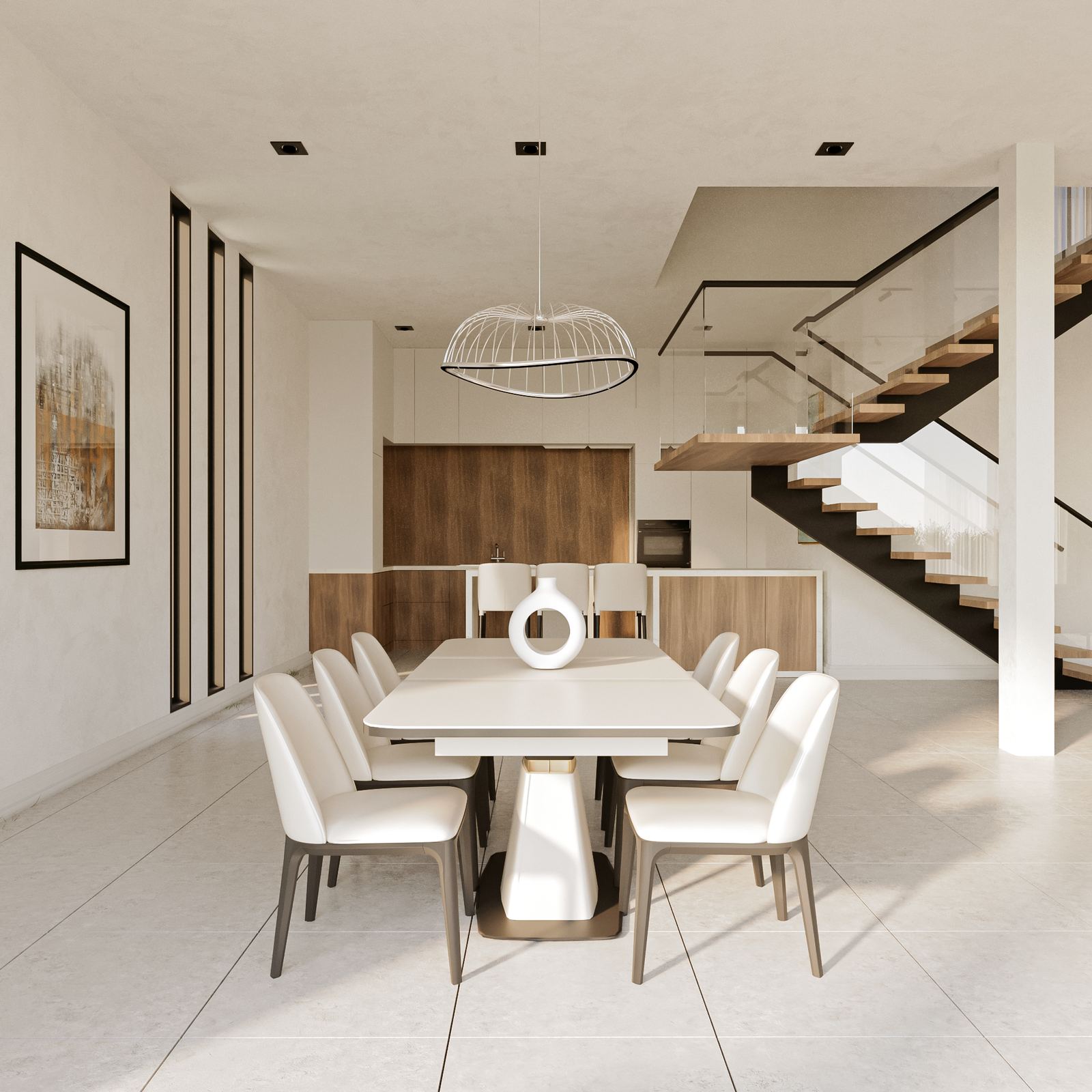 N200 signature villa — dining area beneath a sculptural pendant light with staircase beyond