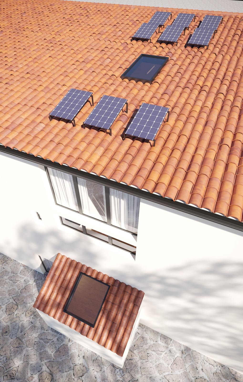 Casa Progresso — aerial view of the new roof extension and solar panels over the original clay-tiled roof